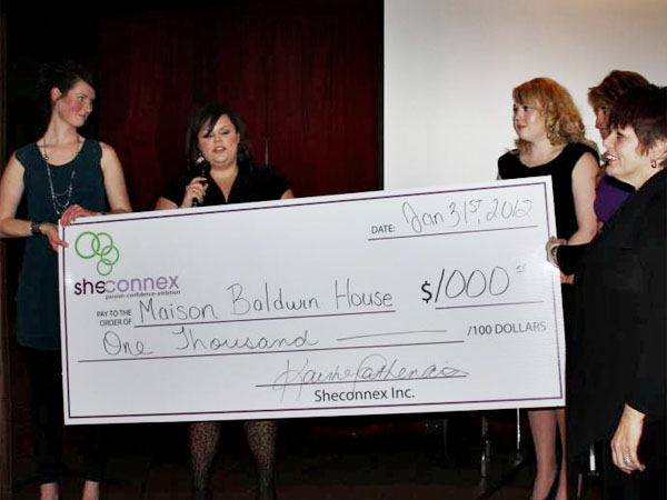 SNAPSHOT - Sheconnex presents $1,000 cheque to Baldwin House